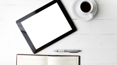 defter ve kahve Kupası ile tablet