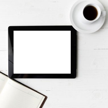 defter ve kahve Kupası ile tablet