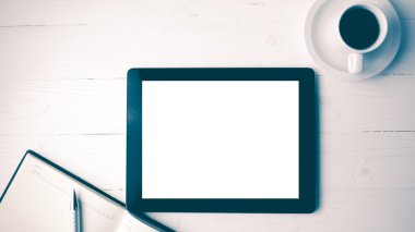defter ve kahve Kupası vintage tarzı ile tablet