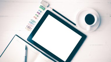 defter ve kahve Kupası vintage tarzı ile tablet