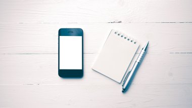 Not defteri ve kalem vintage tarzı ile cep telefonu