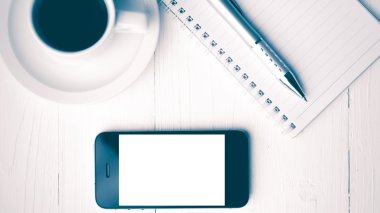 cep telefonu ile defter ve kahve Kupası vintage tarzı