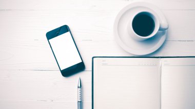 cep telefonu ile defter ve kahve Kupası vintage tarzı