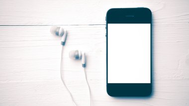 cep telefonu kulaklık vintage tarzı ile