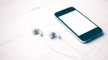 cep telefonu kulaklık vintage tarzı ile