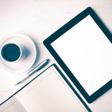 defter ve kahve Kupası vintage tarzı ile tablet