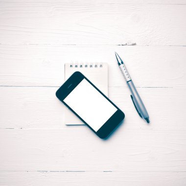 Not defteri ve kalem vintage tarzı ile cep telefonu