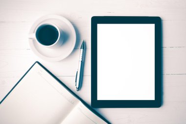 defter ve kahve Kupası vintage tarzı ile tablet