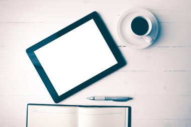 defter ve kahve Kupası vintage tarzı ile tablet