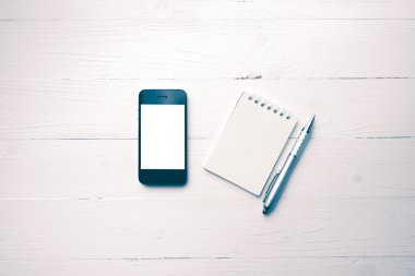 Not defteri ve kalem vintage tarzı ile cep telefonu