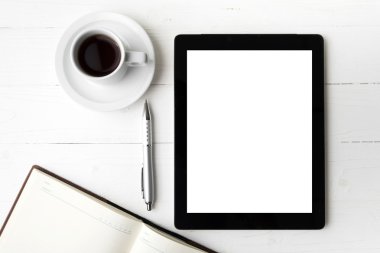 defter ve kahve Kupası ile tablet