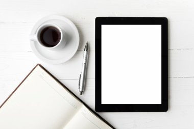 defter ve kahve Kupası ile tablet