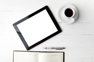 defter ve kahve Kupası ile tablet