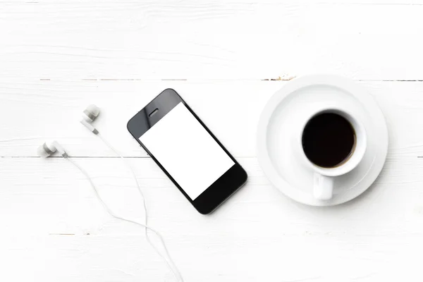 携帯電話とコーヒー カップ ロイヤリティフリーのストック画像