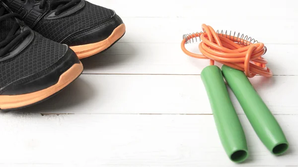 Fitness equipment on white wood table — Stock Photo, Image