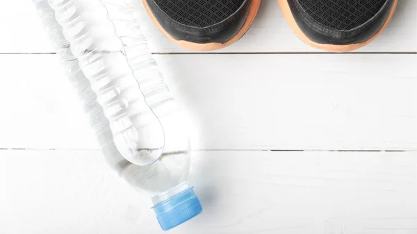 Fitness equipment on white wood table — Stock Photo, Image