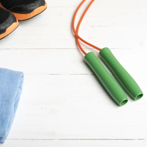 fitness equipment on white wood table