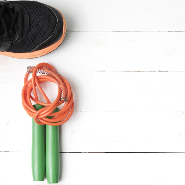 fitness equipment on white wood table