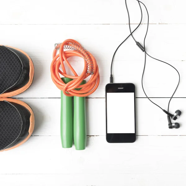 fitness equipment on white wood table