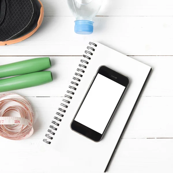 Fitness equipment on white wood table — Stock Photo, Image