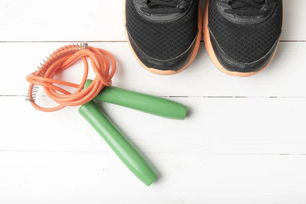 Running shoes and jumping rope — Stock Photo, Image