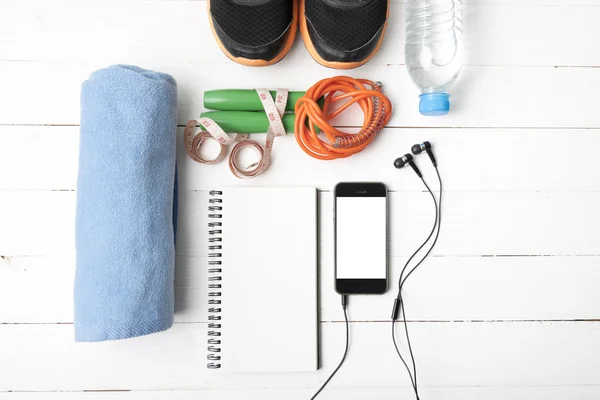 fitness equipment on with wood table