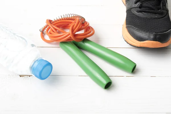 fitness equipment on with wood table