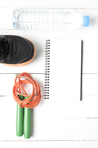 fitness equipment on with wood table