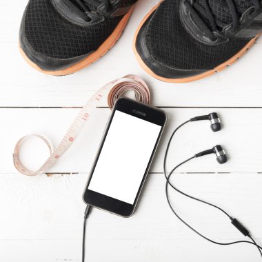 koşu ayakkabıları, teyp ve telefon ölçme