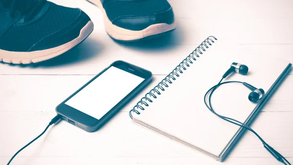 running shoes,notebook and phone vintage style