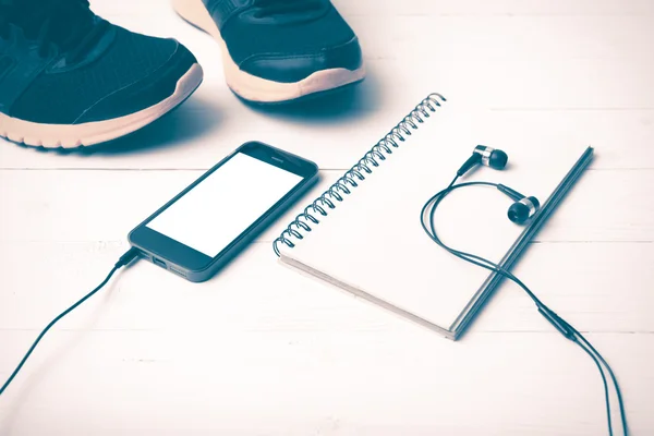 running shoes,notebook and phone vintage style