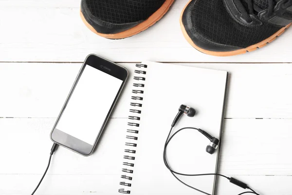 running shoes,notebook and phone