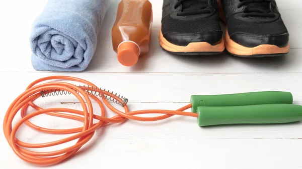 Fitness equipment on white wood background — Stock Photo, Image