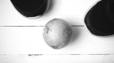 running shoes and earth ball black and white tone color style