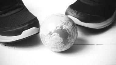 running shoes and earth ball black and white tone color style