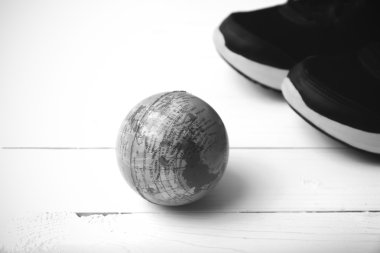running shoes and earth ball black and white tone color style