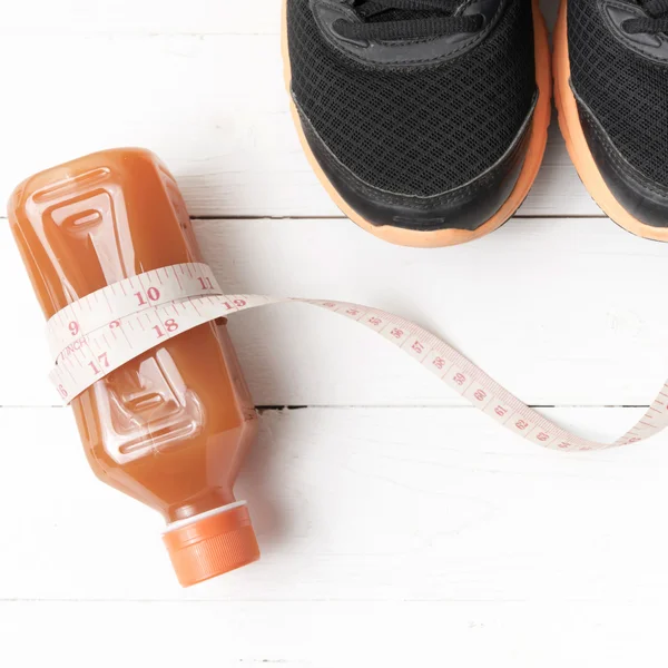 Scarpe da corsa, succo d'arancia e telefono — Foto Stock