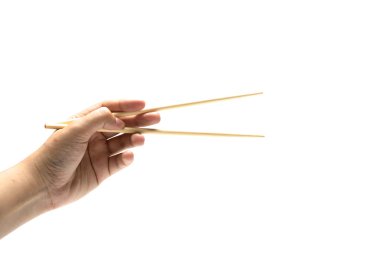 elini tutarak yemek çubuğu