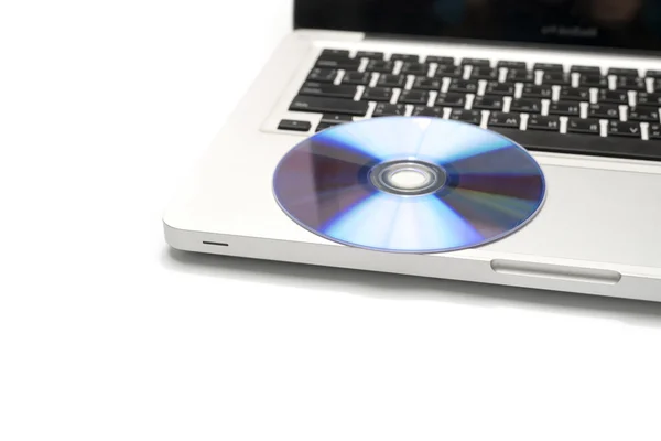 DVD тарілка на ноутбуці — стокове фото