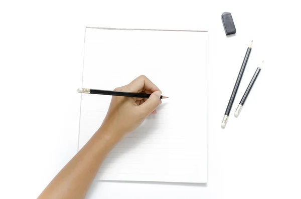 Höger hand skriva på papper — Stockfoto