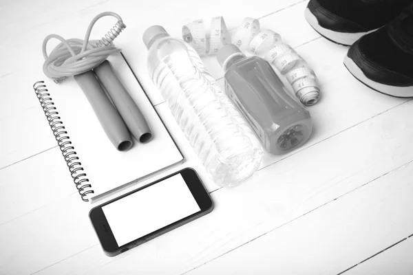 Fitness equipment on white wood background vintage style black a — Stock Photo, Image