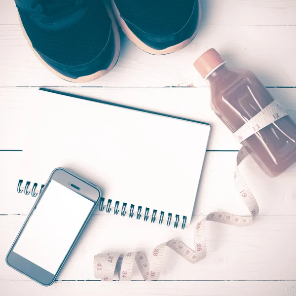 fitness equipment on white wood background vintage style