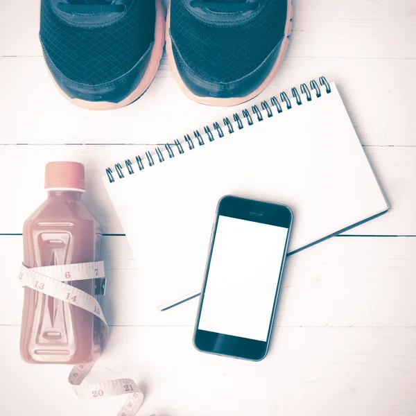 fitness equipment on white wood background vintage style