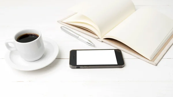 Xícara de café com telefone e notebook — Fotografia de Stock