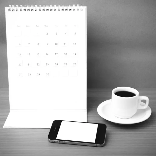 Coffee cup and phone and calendar — Stock Photo, Image