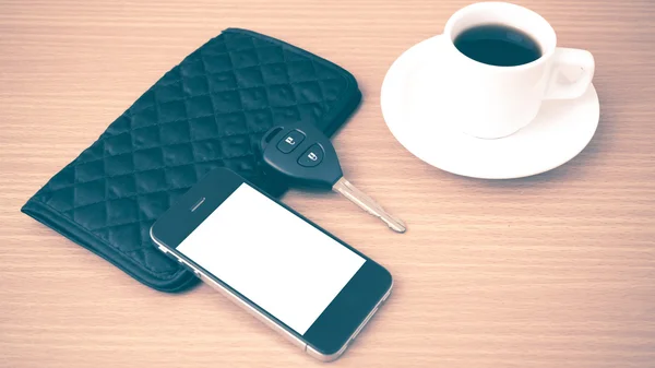 Coffee cup with phone car key and wallet — Stock Photo, Image