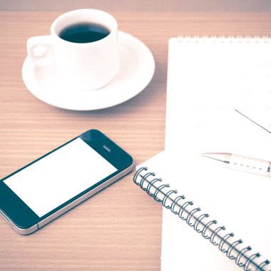 kahve, telefon, not defteri ve takvim