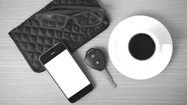 Coffee, phone, car key, eyeglasses and wallet — стоковое фото