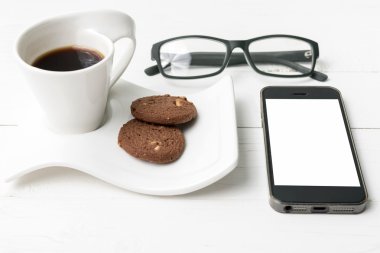 tanımlama bilgisi, telefon ve gözlük ile kahve fincanı 