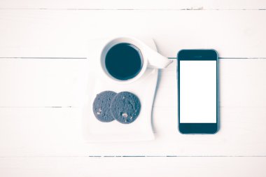 tanımlama bilgisi ve telefon vintage tarzı ile kahve fincanı